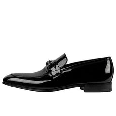 MOCASSIN GUCCI AVEC MORS EN CUIR VERNIS NOIR.
